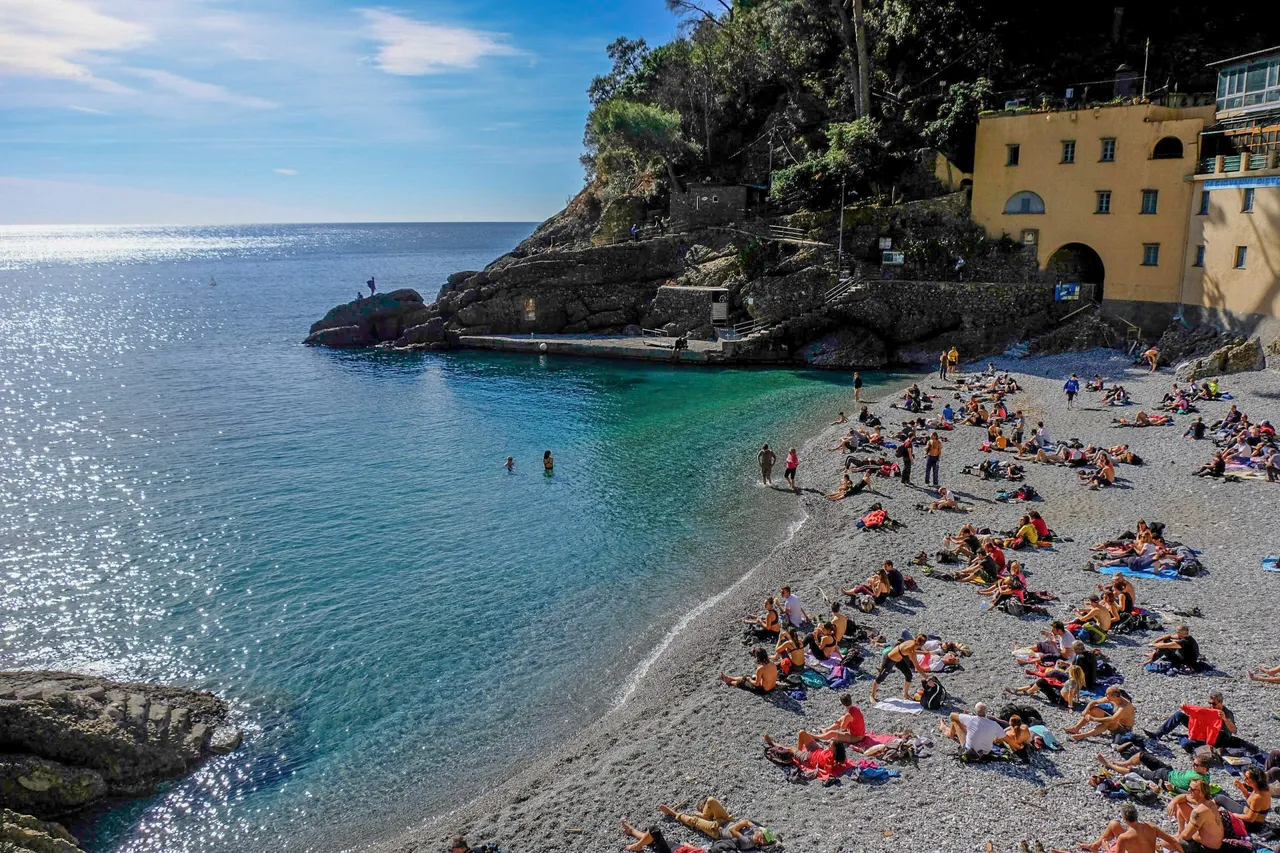 The iconic, luxurious harbor of Portofino with superyachts